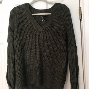 Olive green sweater with detailed cut out sleeves
